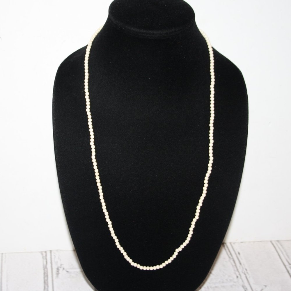 Beautiful cream beaded necklace 36"